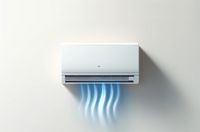 Wall-mounted air conditioner emitting cool air, showcasing efficient indoor climate control.